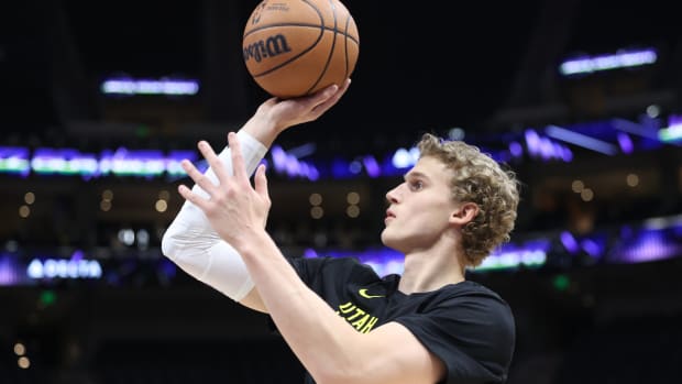 Jazz forward Lauri Markkanen warms up before a game.